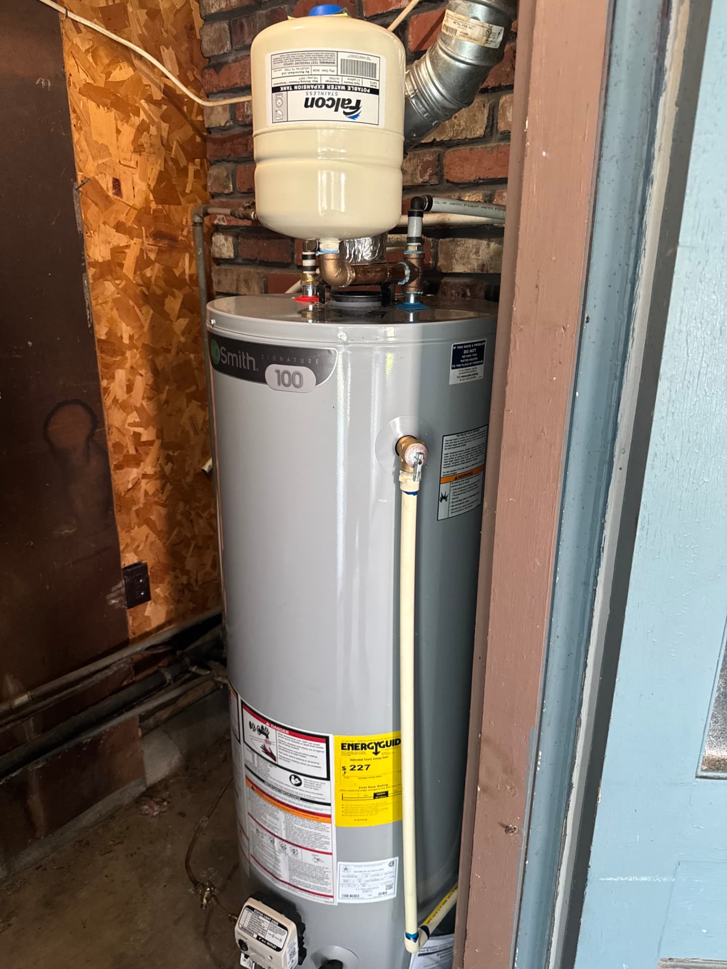 Newly installed A.O. Smith tank water heater with expansion tank in a Gadsden AL home
